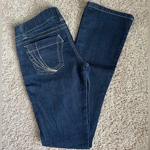 Arden B denim jeggins, low rise and boot-cut skinny fit. 39 1/2 inches long.